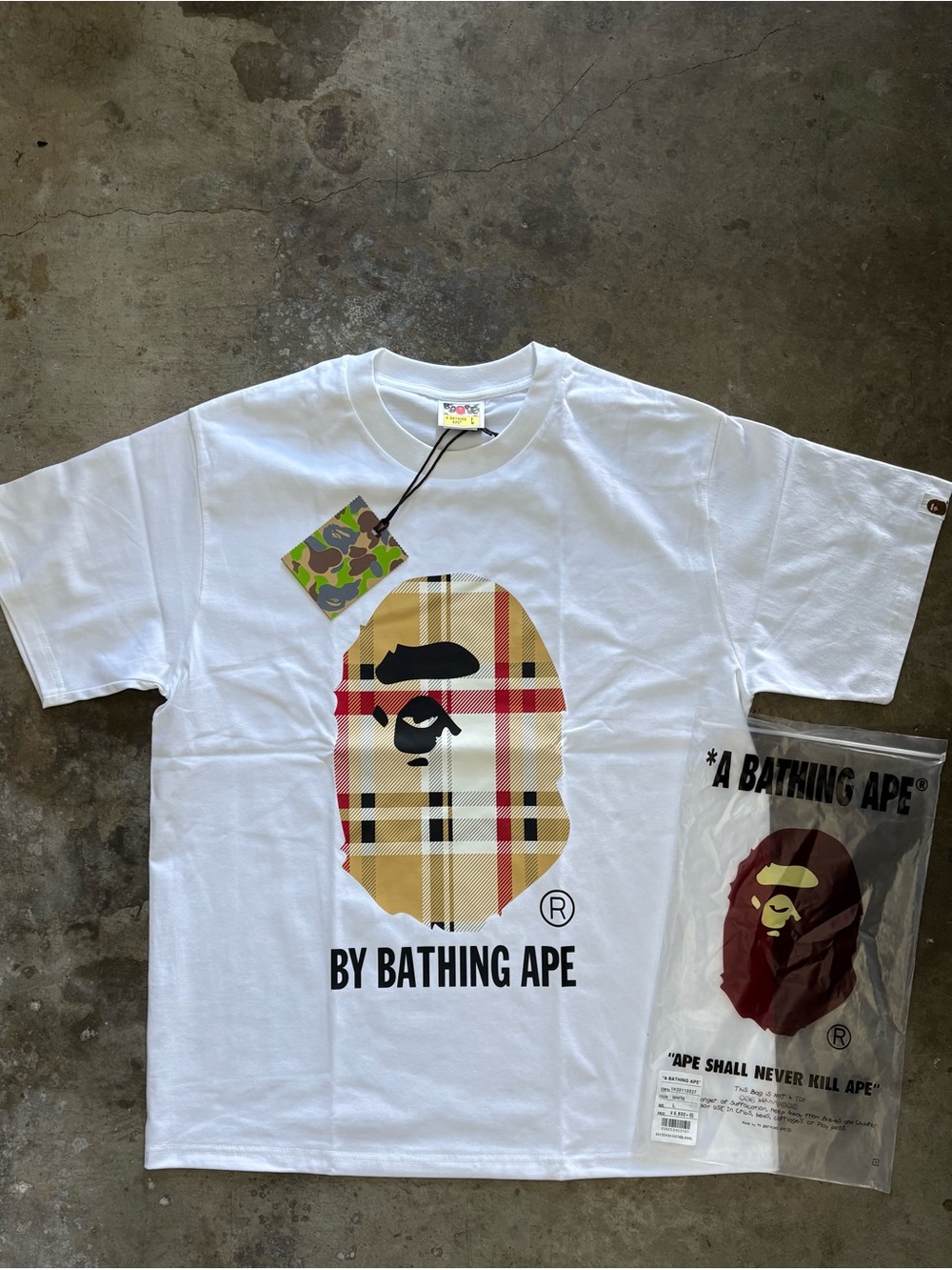A Bathing Ape White Tee with Plaid Ape Logo